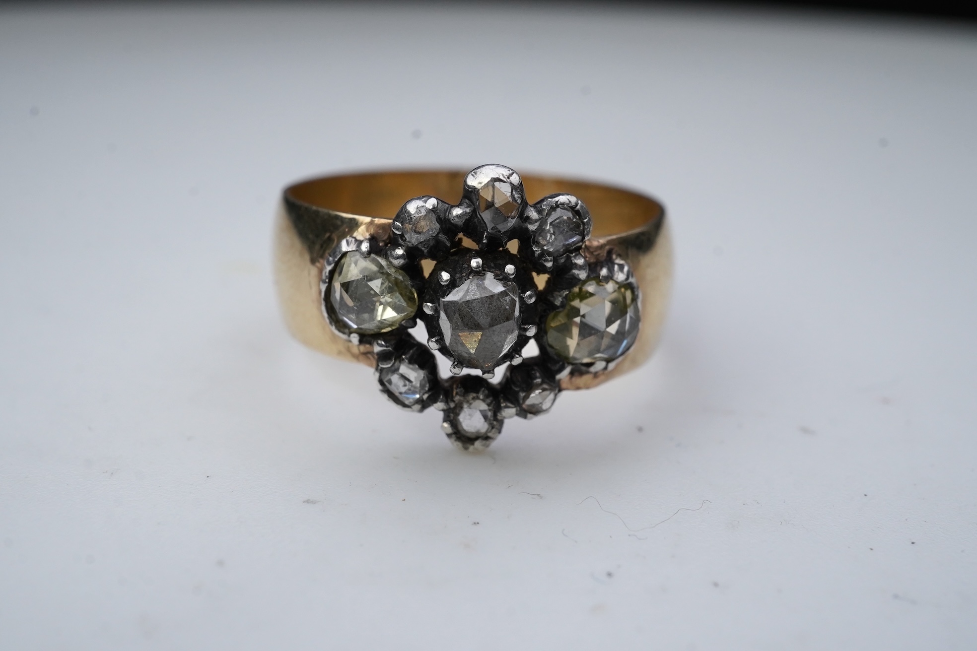A gold and diamond ring